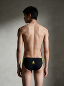 Slip da nuoto bambino da allenamento H2OTTO 233HF - Outline giallo fluo: vista posteriore indossato